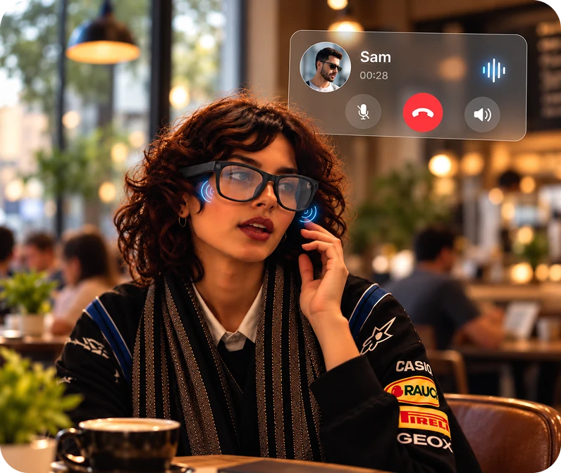 A woman taking a call through her glasses