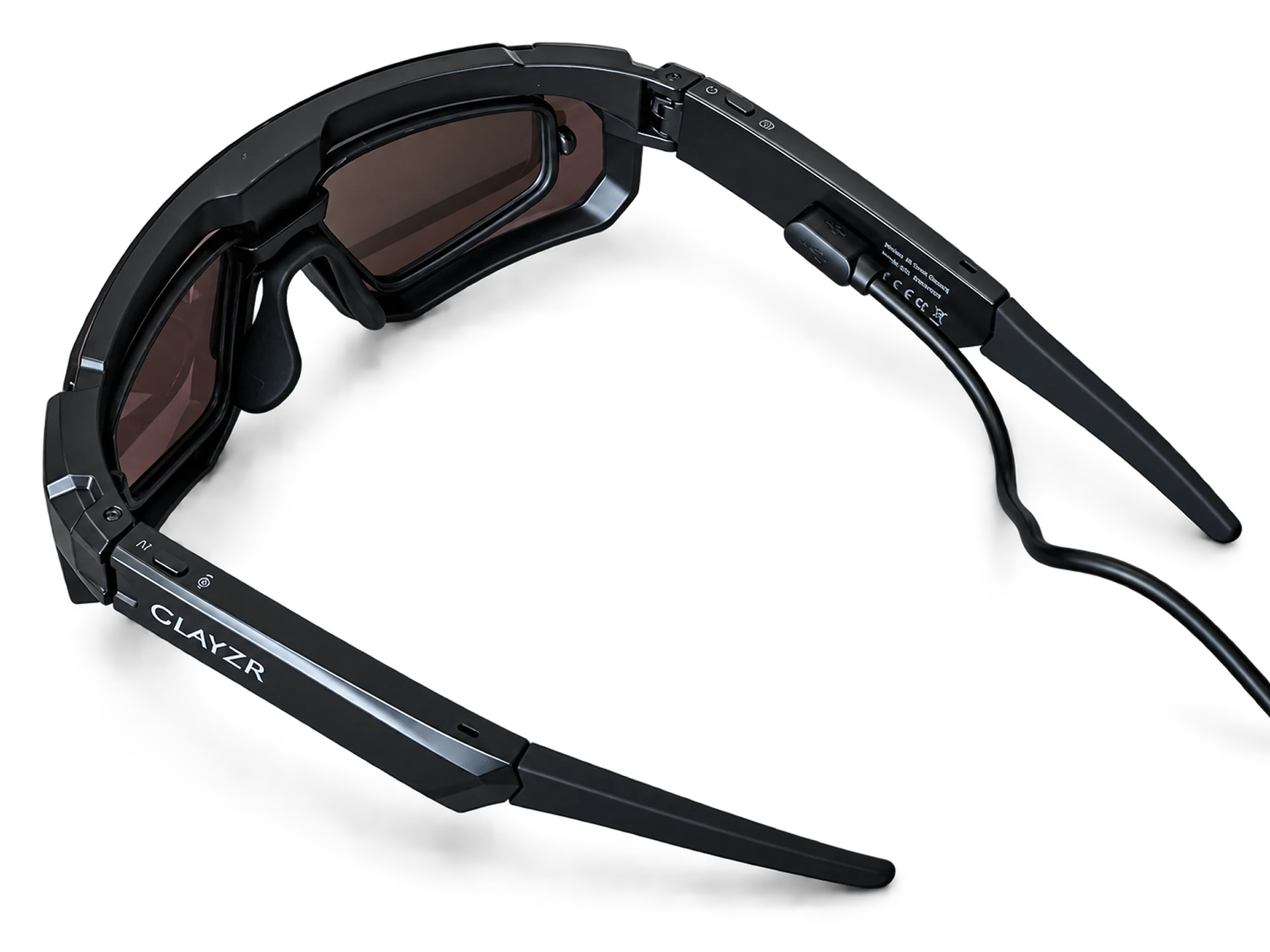 Rear view of the glasses charging through the magnetic USB cable